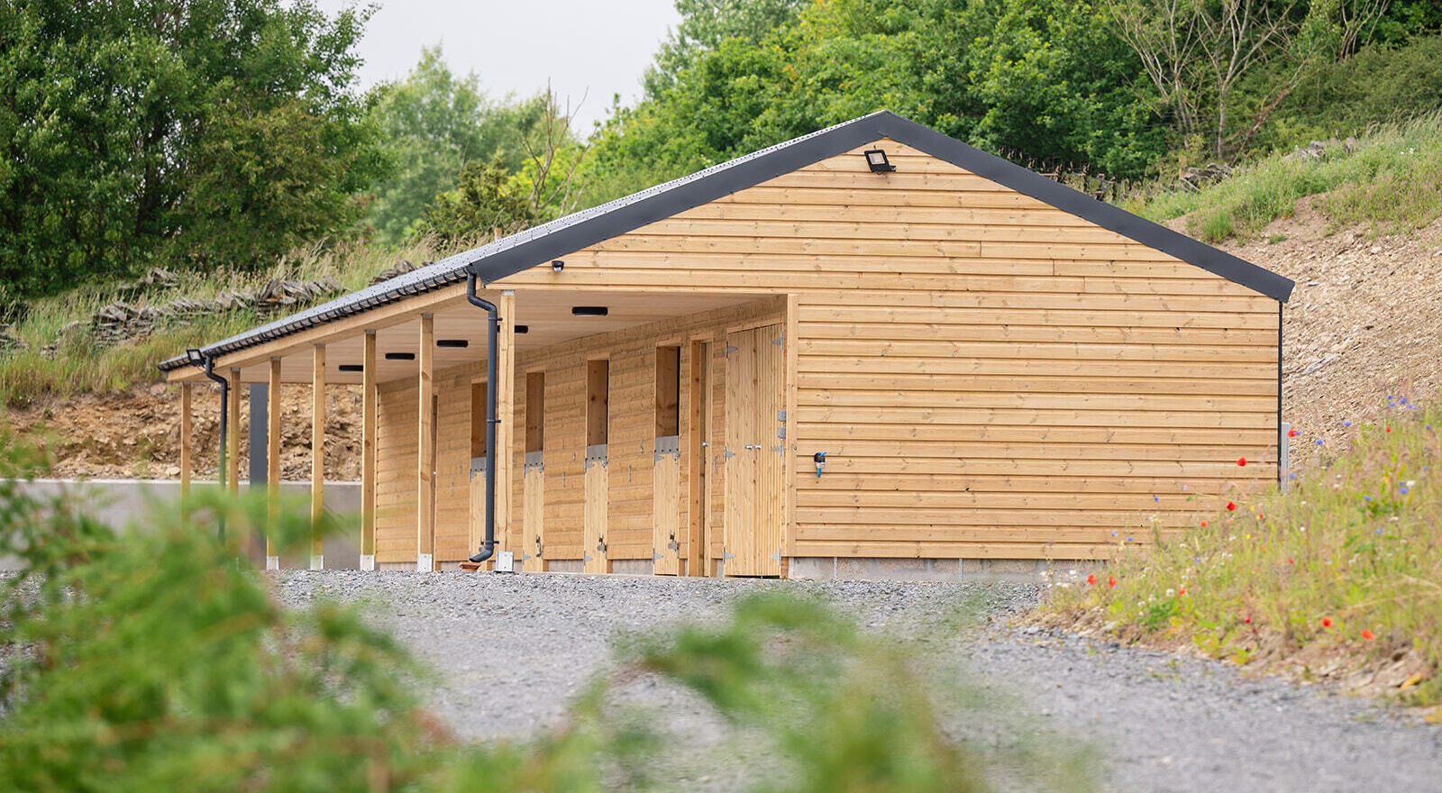 External view of Logie Newton stable block showing 4 stables and storage rooms